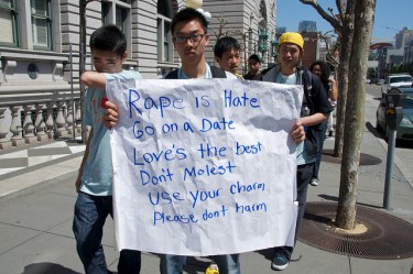 "Rape is hate. Go on a date. Love is the best. Don't molest. Use your charm. Please don't harm." Photo by Steve Rhodes on Flickr (CC BY-NC-ND 2.0).