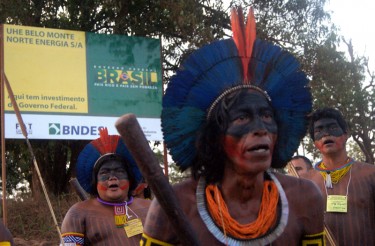 Indigenous protestors at the entrance of the construction site. © Ivan Canabrava/ Illuminati filmes shared by Movimento Xingu Vivo (used with permission).