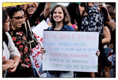 "I just want to be happy, to walk along freely in the clothes I choose, and be sure that, whether dressed in a burka or in hot pants, everyone will respect me". Placard with the lyrics of a song which was sung by protestors around the country. Photo by Vinicius Sobreira, under CC licence