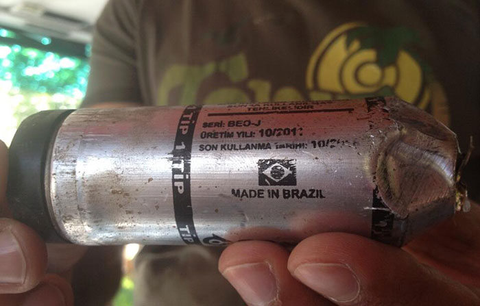 An American professor photographed one of the Brazilian tear gas projectiles used by the turkish police. Image: Suzette Grillot/ Under license from Creative Commons